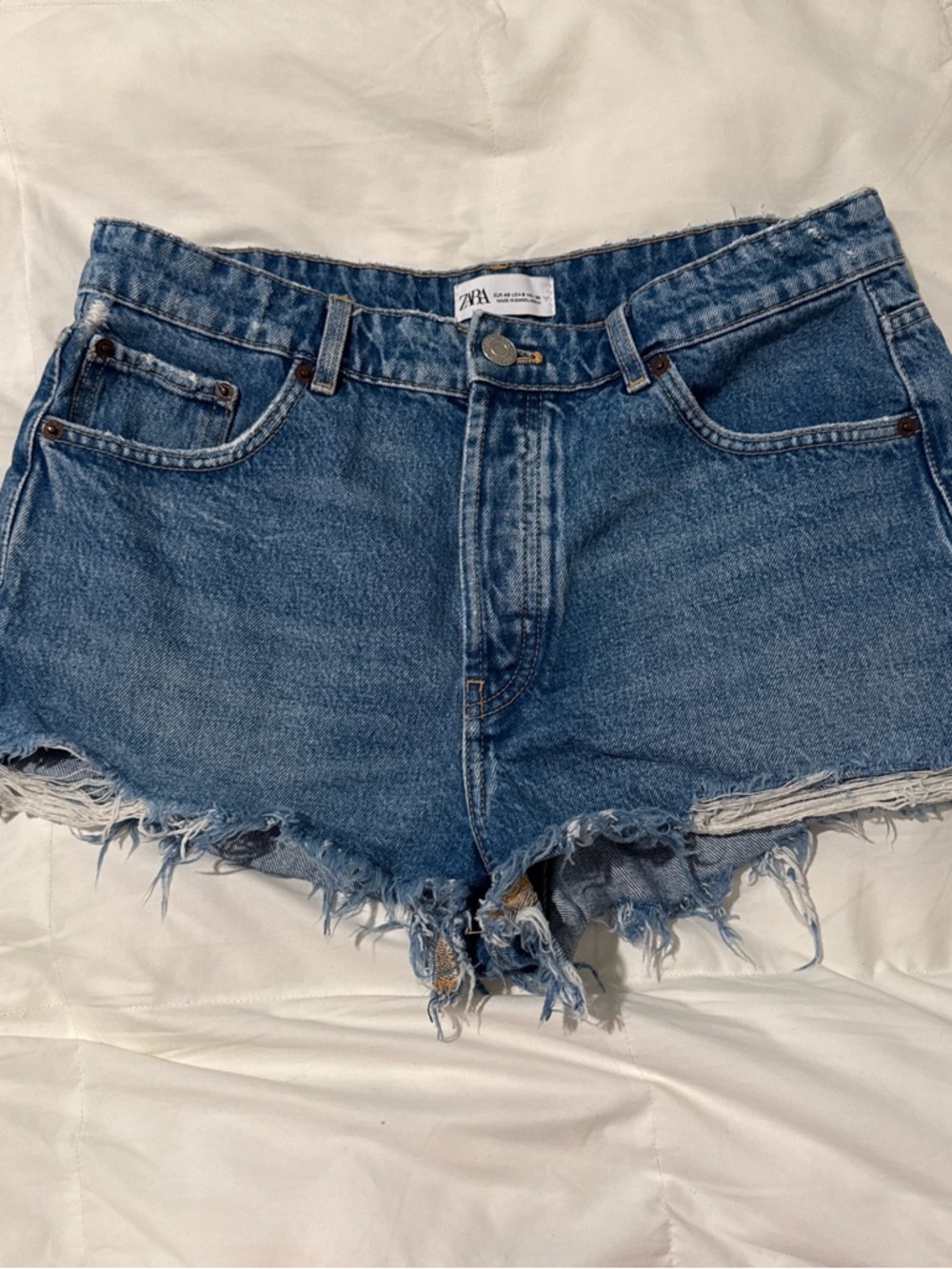Zara Distressed Light Blue Denim Cutoff Shorts